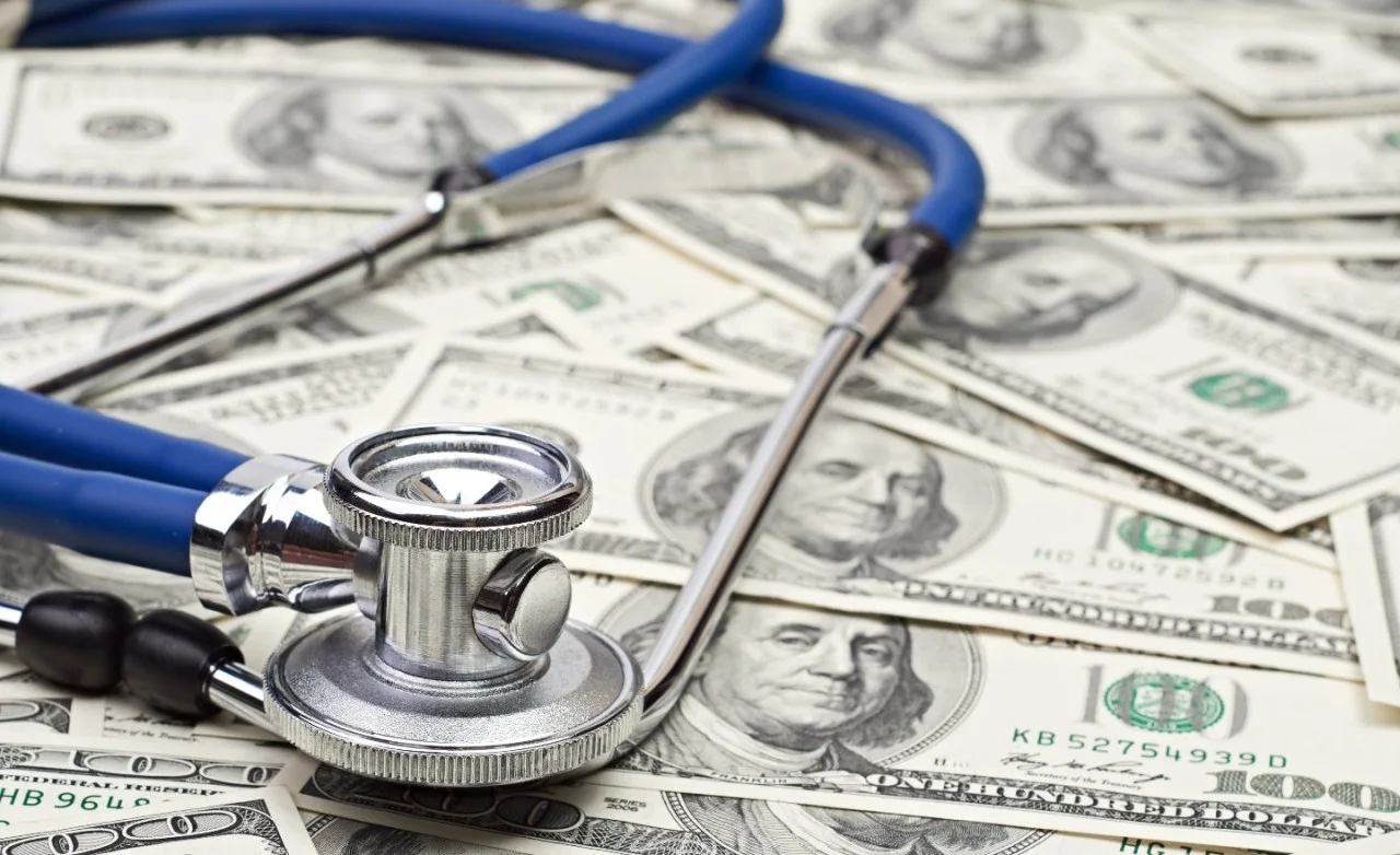 Debt ceiling debate threatens health insurance and calls for phony spending cuts.