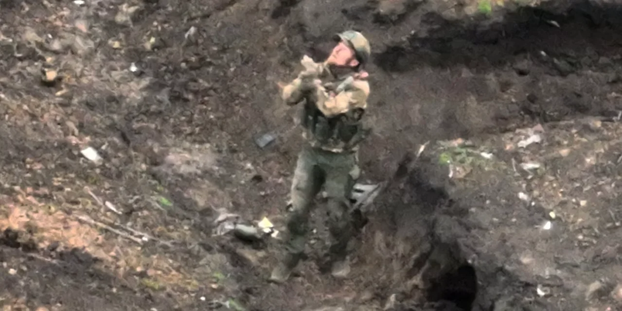 Abandoned Russian Soldier Surrenders to Ukrainian Drone, Watches Comrades Perish.