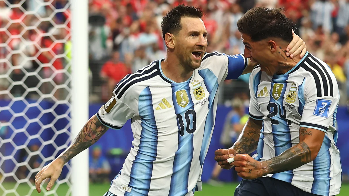 Messi makes World Cup history as Argentina edge Austria in Group J
