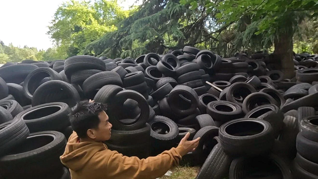 Portland yard buried under hundreds of tires prompts investigation