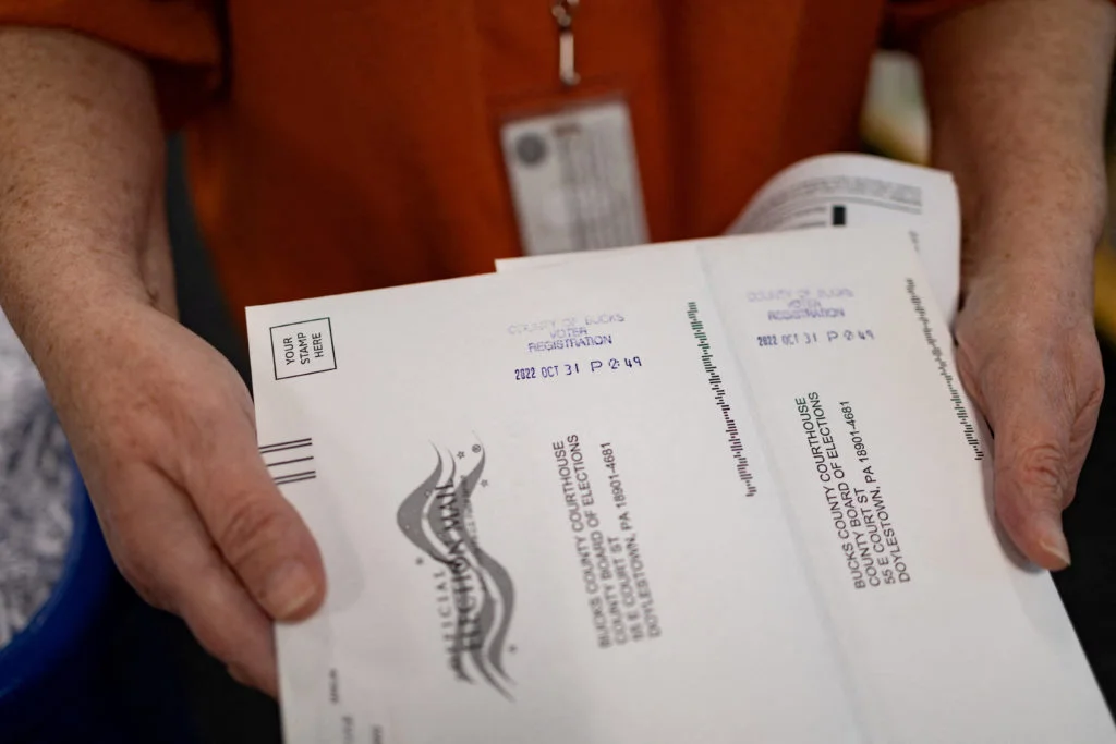 Court won’t block Trump’s federal voter-list and mail-voting plan