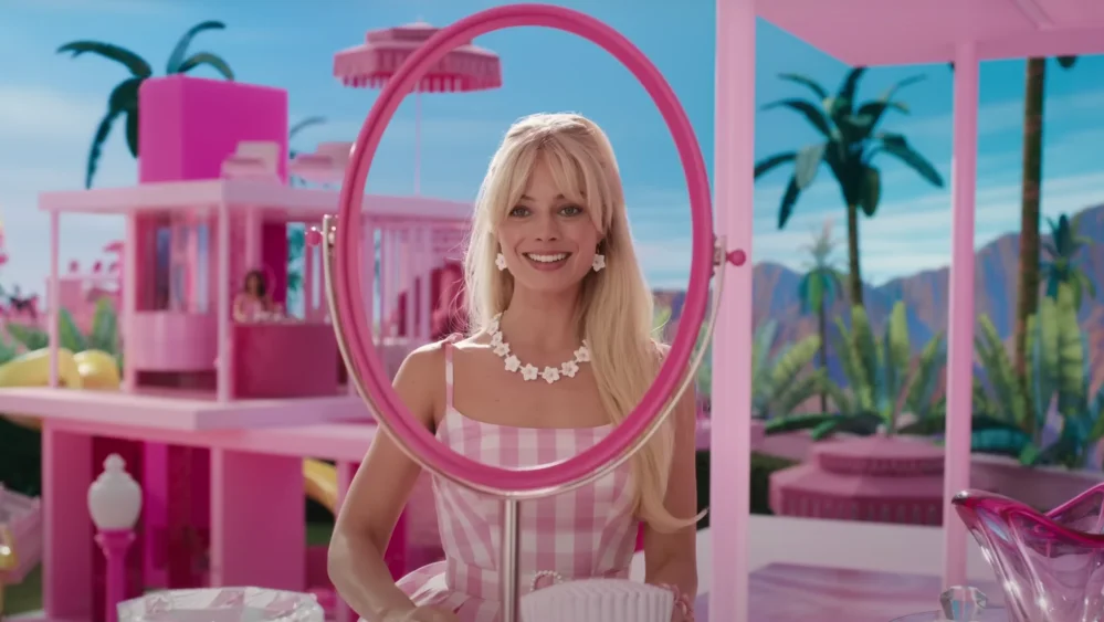 Margot Robbie discusses Barbie movie and casting choices in Vogue interview.