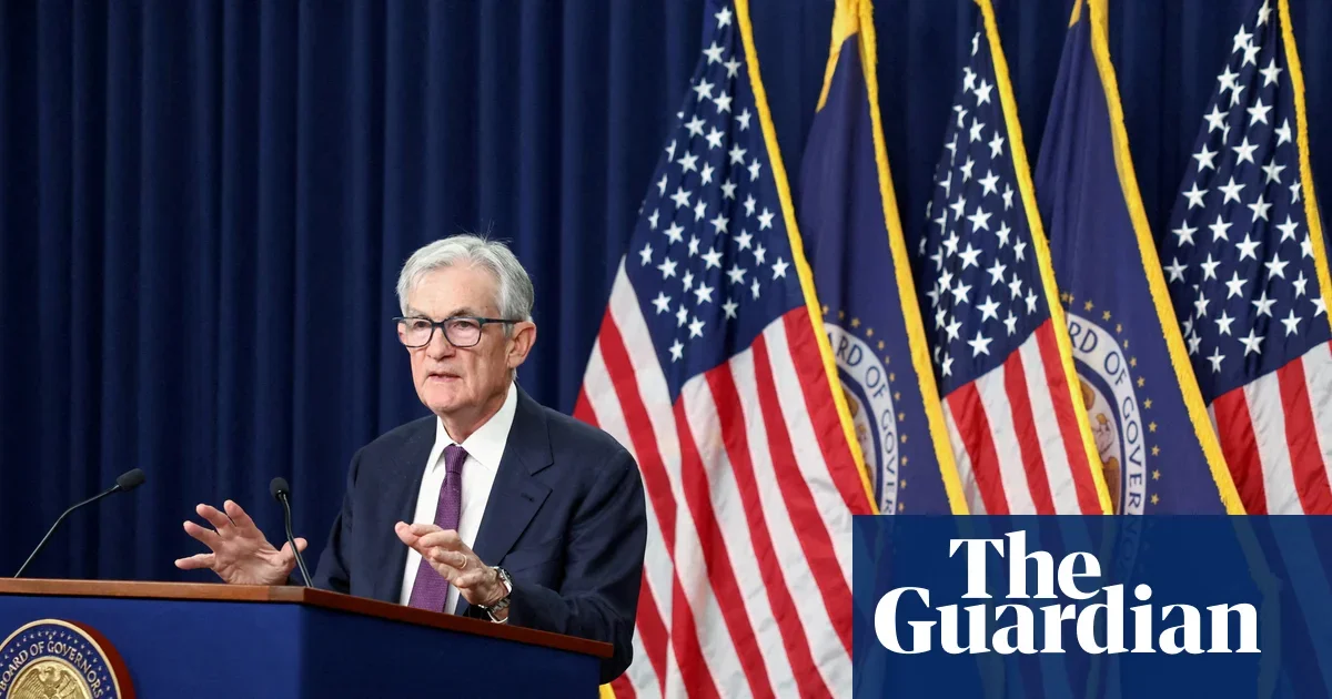 Powell stays on Fed board as rates hold steady amid political pressure