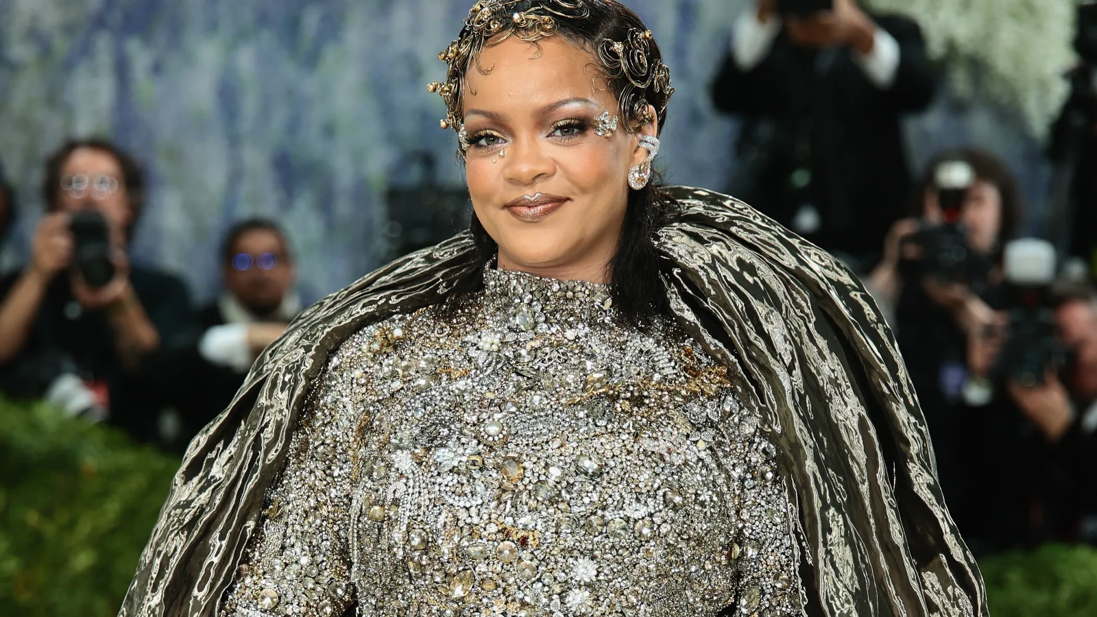 Rihanna lights up Barbados Crop Over with a flamboyant feathered carnival look