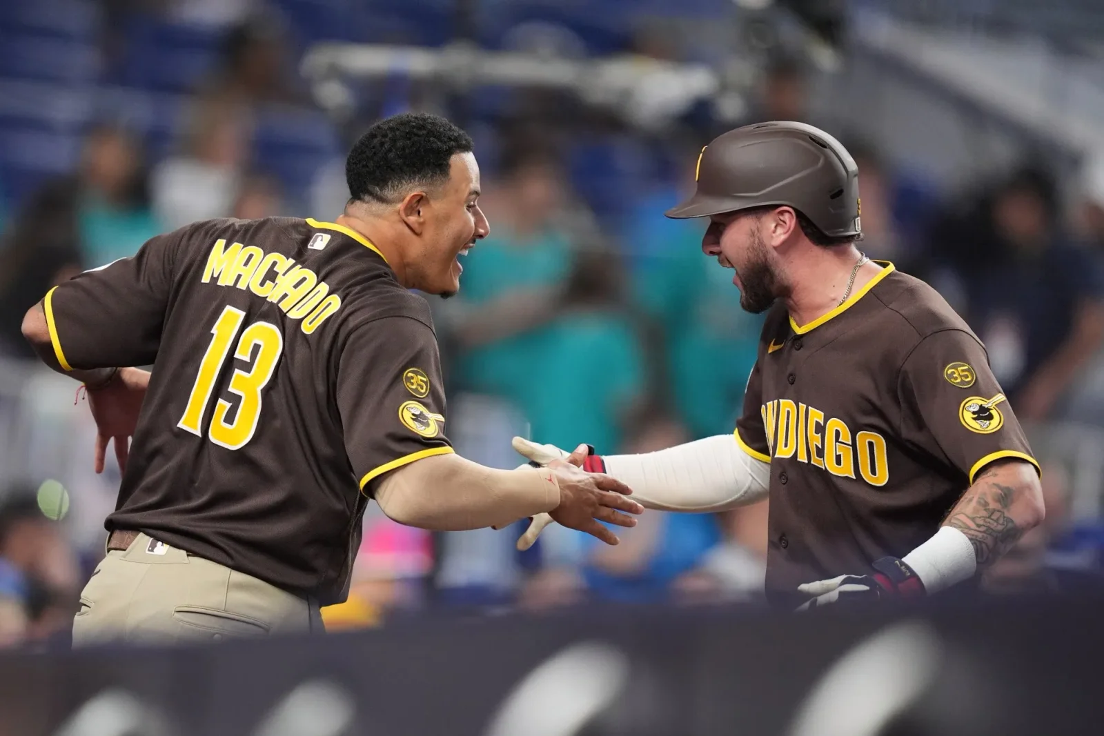 Machado, Merrill spark Padres' late rally to sweep Marlins