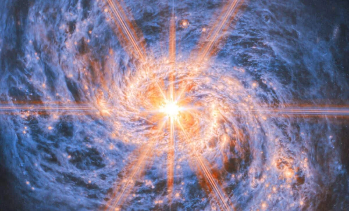 Webb Telescope Reveals Distant Galaxy's Luminous Core Fueled by a Feeding Black Hole