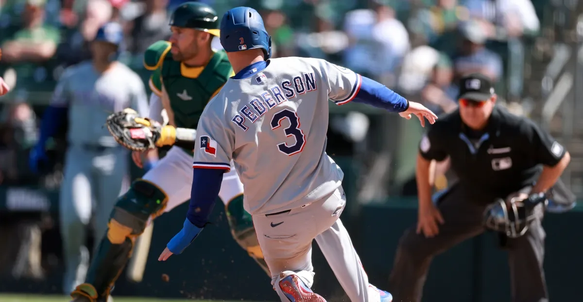 Rangers rally past A's in wild, wind-swept Sacramento win