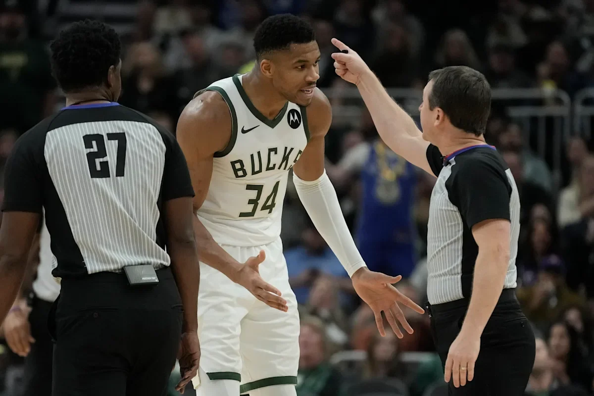 "Controversial Ejection Mars Bucks' Close Win as Giannis Antetokounmpo Takes Courtside Seat"