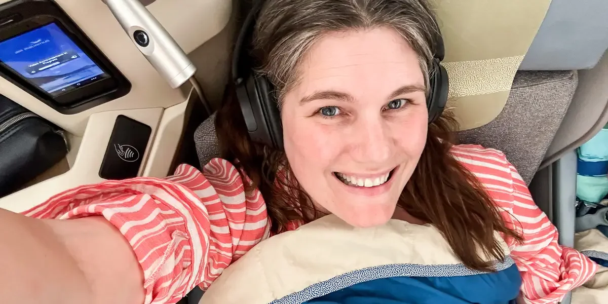 "Mom's Business Class Flight Sparks Feminist Debate"