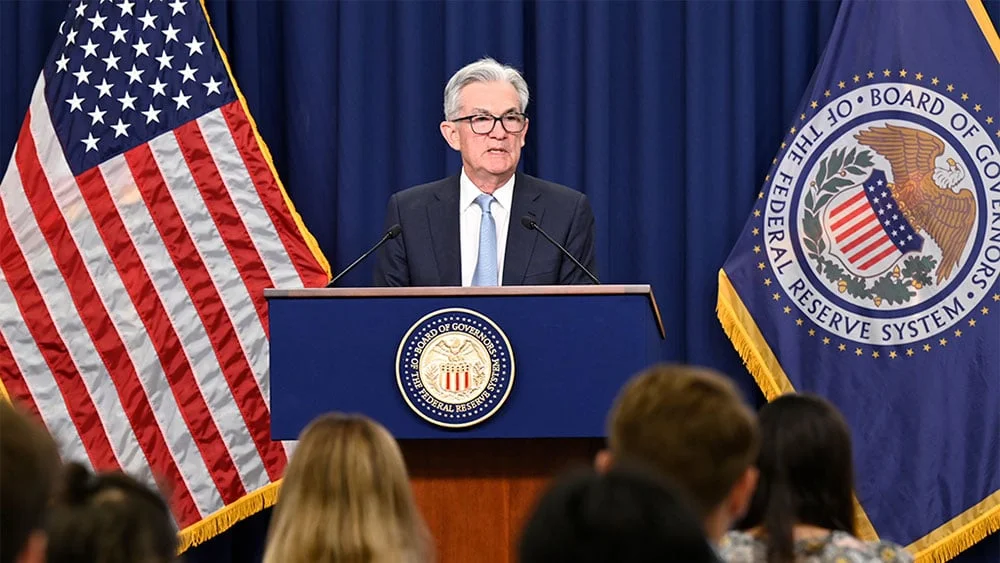 Powell's rate hike hints cause stock market drop