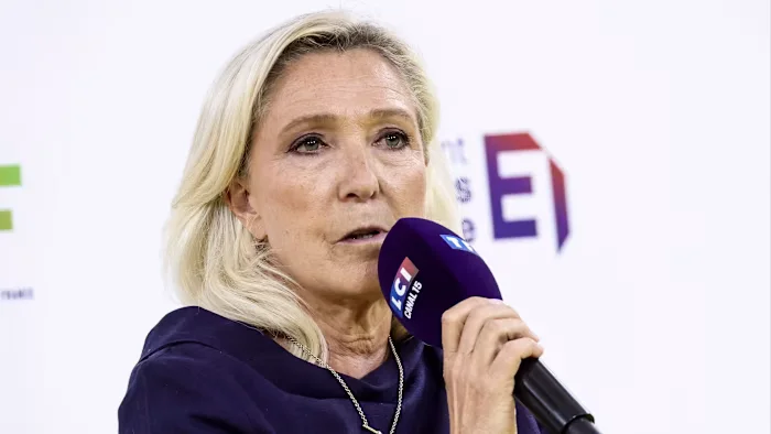 Le Pen pledges sweeping spending cuts to woo French business leaders