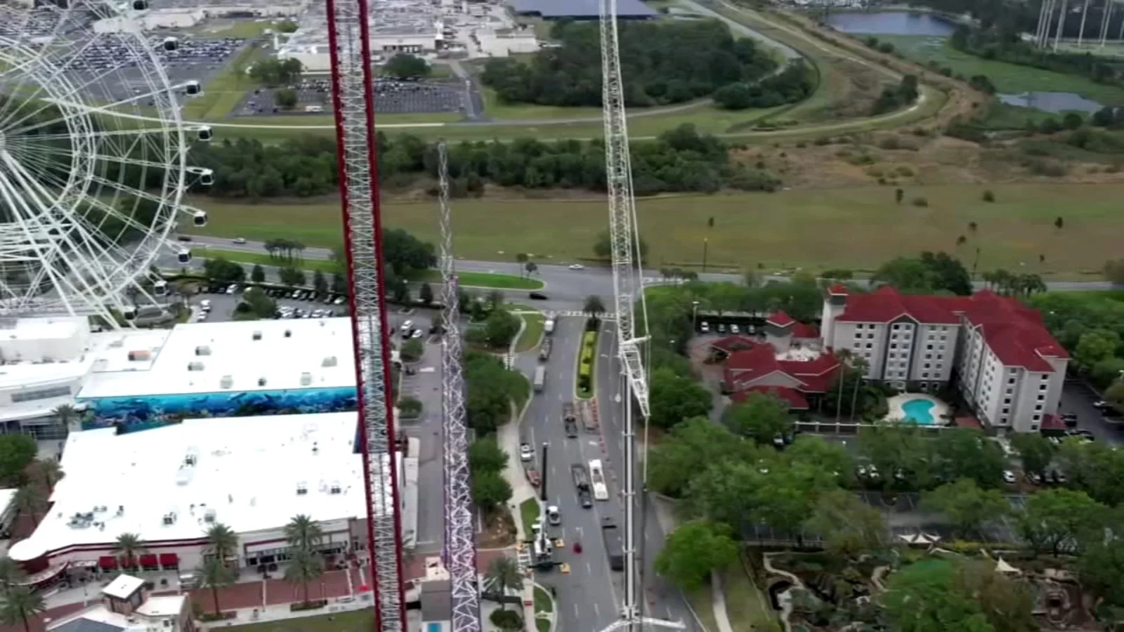 Mother of teen who died on Orlando ride reaches settlement and witnesses attraction's demolition.