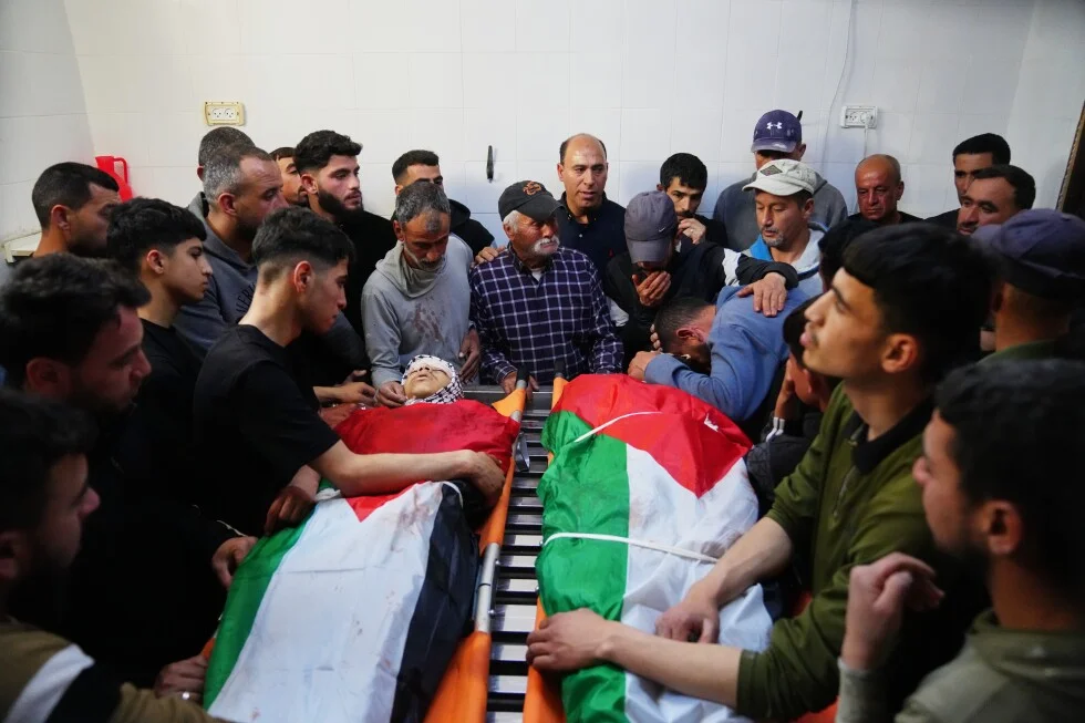 West Bank shooting by Israeli reservist leaves two dead, including 14-year-old
