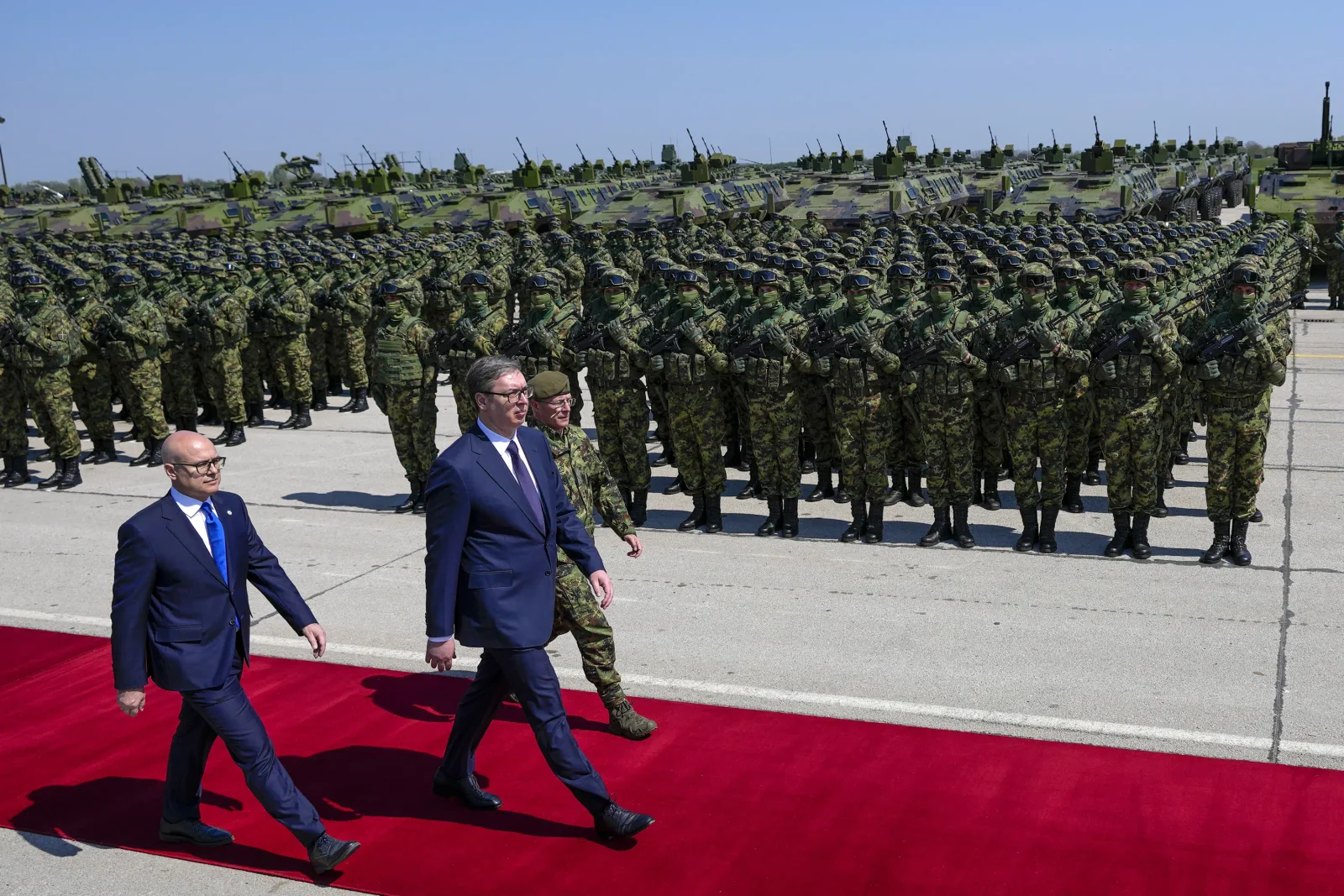 Serbian and Hungarian leaders witness military showcase in Serbia.