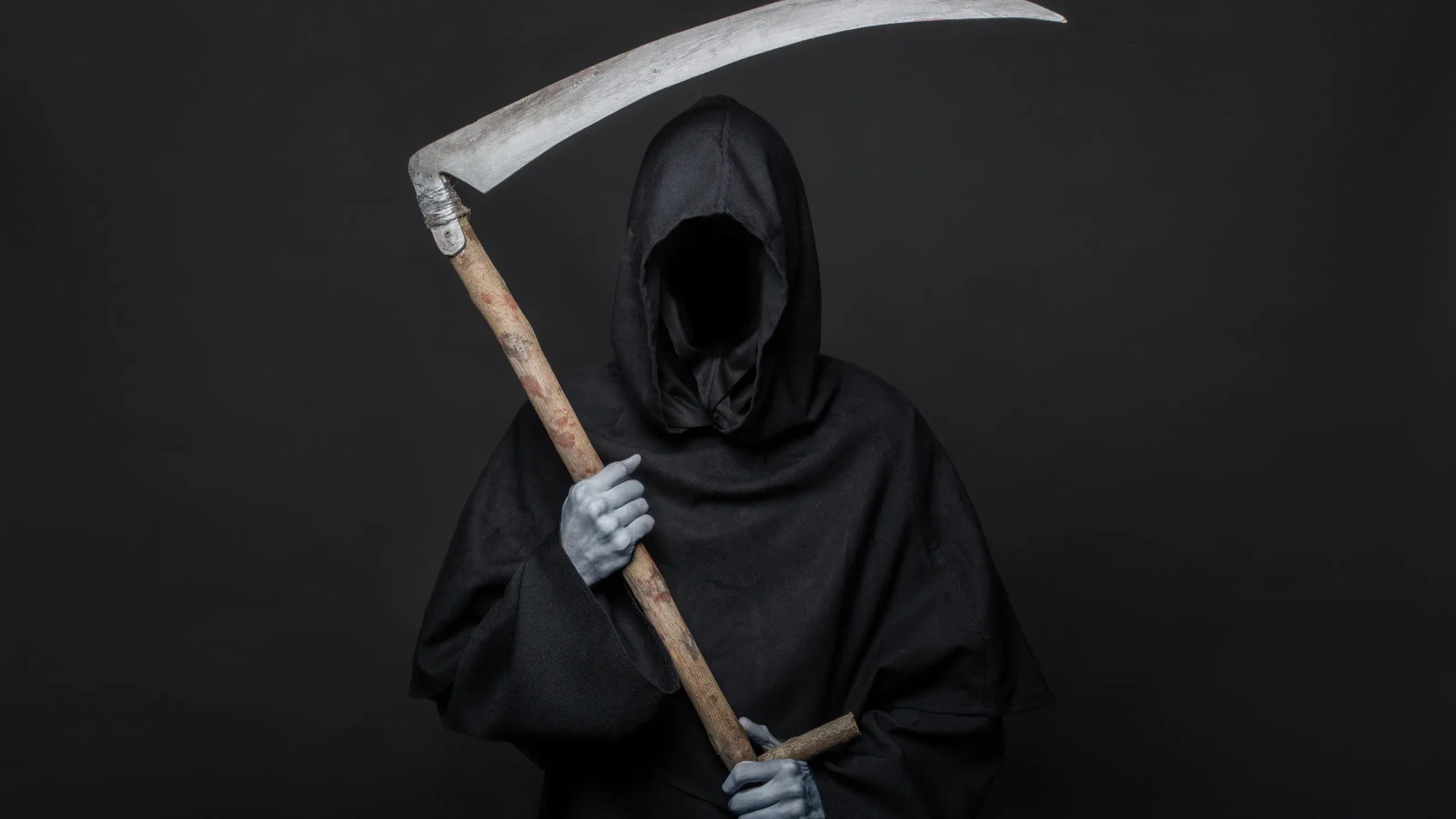 Grim Reaper on Welsh hospital roof ends in arrest and fines