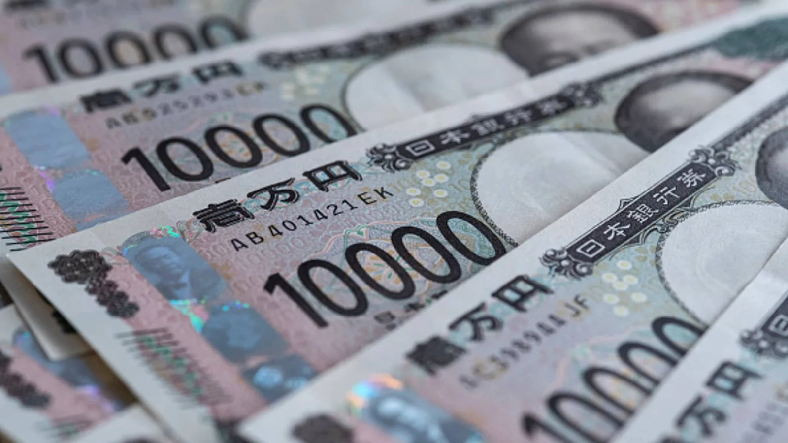 Dollar slips near two-week low as Fed bets fade and yen stays pressured