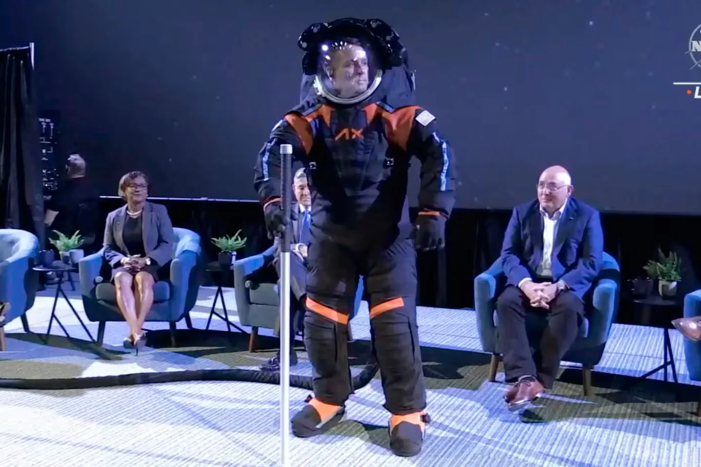NASA and Axiom reveal new spacesuits for Artemis III moon mission.