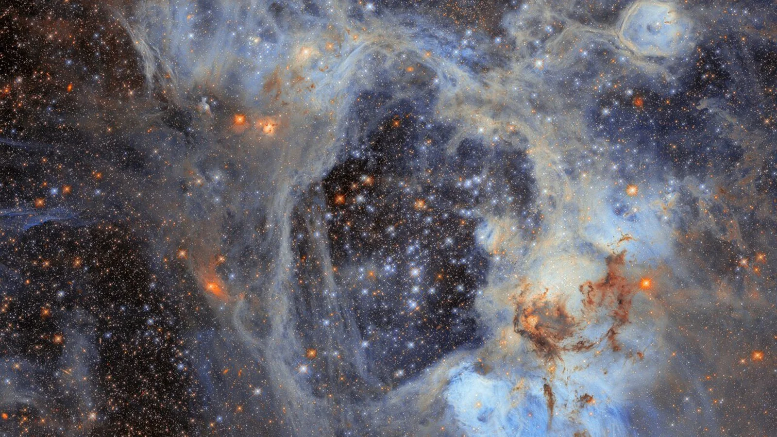 Hubble captures a cosmic birth–destruction cycle in a nearby nebula