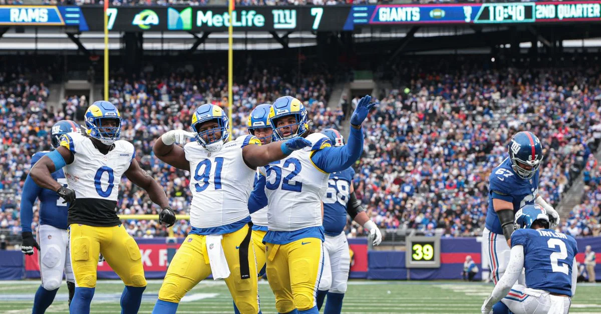 "Rams Secure Playoff Spot with Narrow Victory Over Giants"