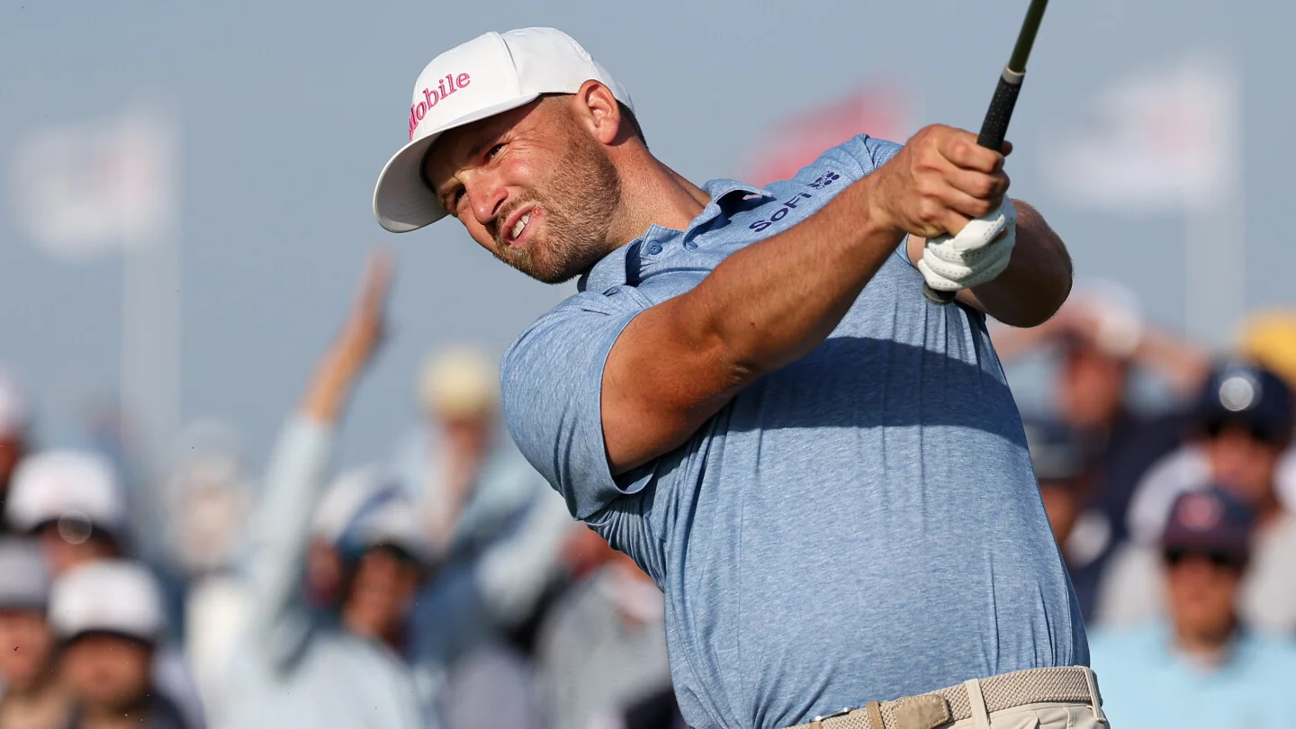 Clark surges to four-shot lead as wind eases in historic U.S. Open opener