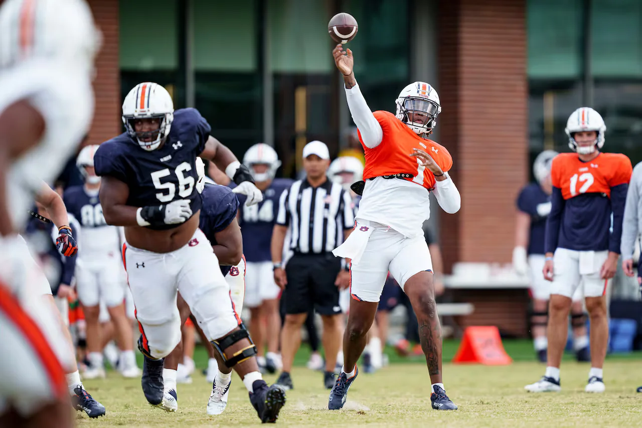 Auburn's QBs and O-line show improvement in spring scrimmage.
