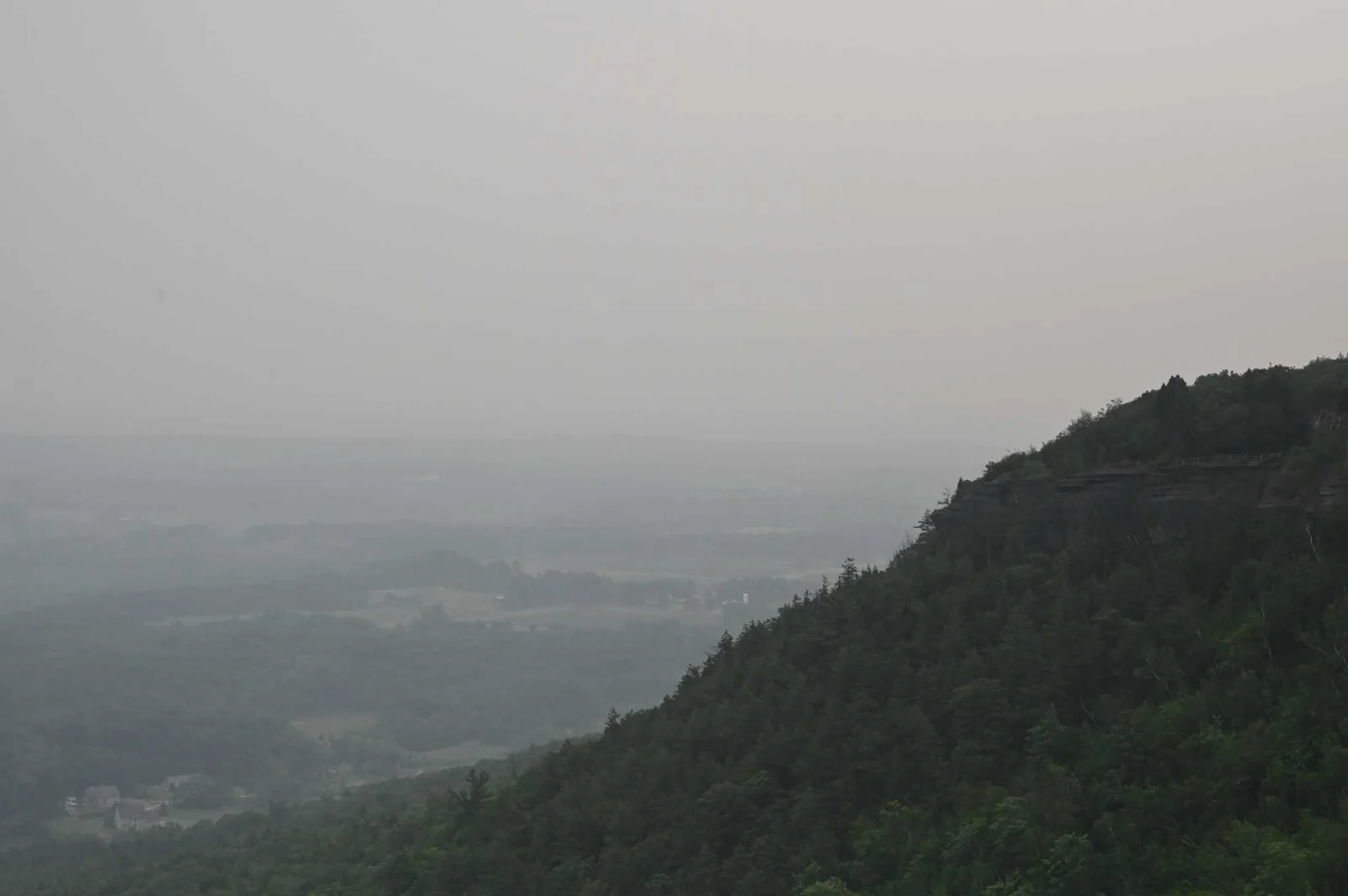 Wildfire smoke spreads across Northeastern US cities.