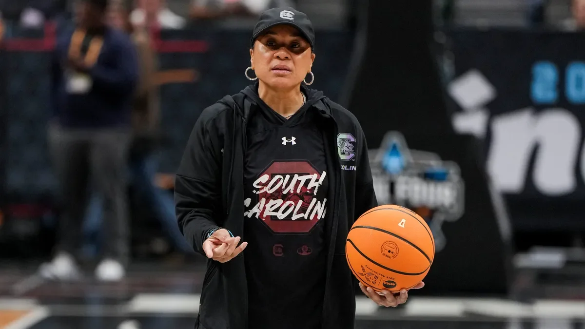 Dawn Staley clarifies coaching aspirations and personal life rumors.