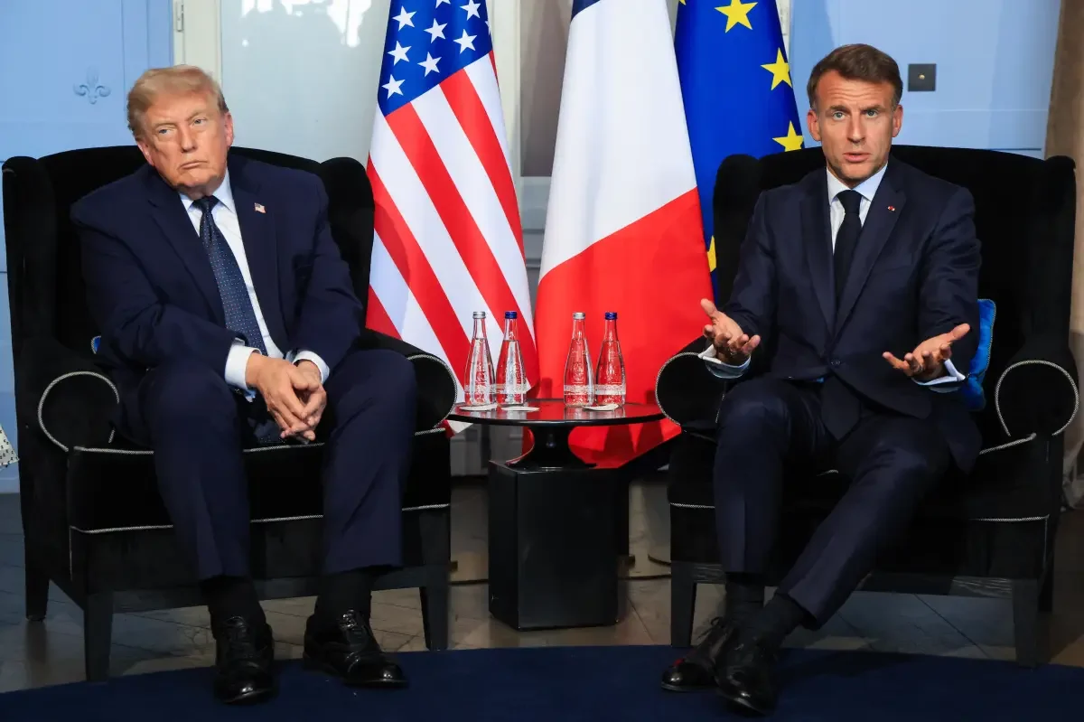 Macron ties Iran aid to a written ceasefire, eyes French carrier for Hormuz mission