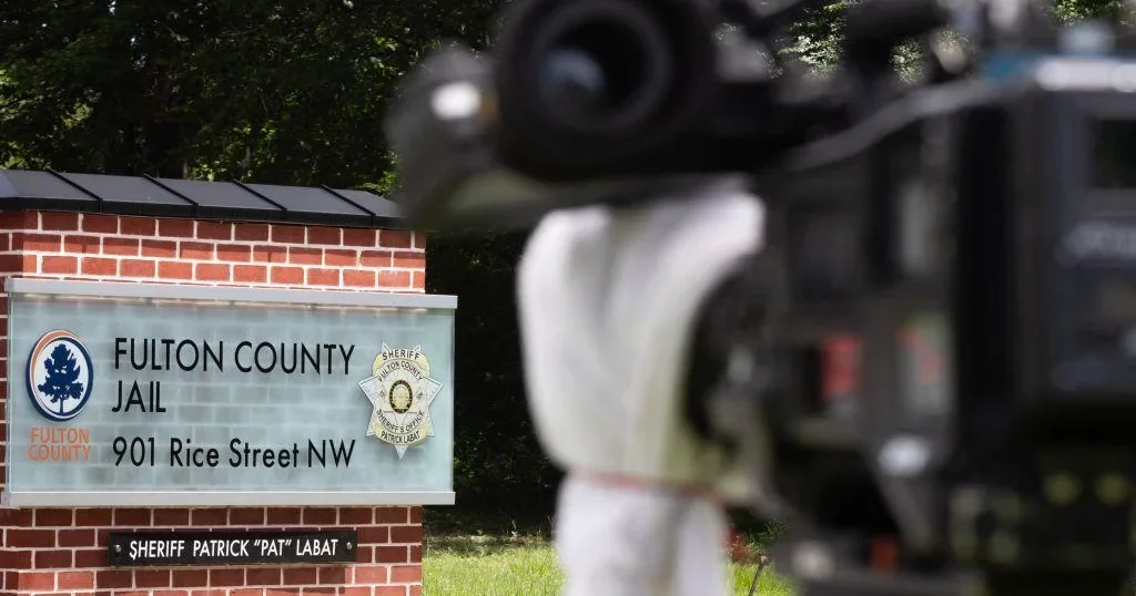 Trump Co-Defendants Surrender Ahead of Fulton County Deadline