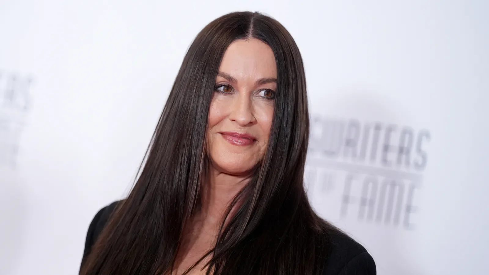 Alanis Morissette Sues Ex-Tour Manager Over Extortion Claims Tied to Airport Drug Incident