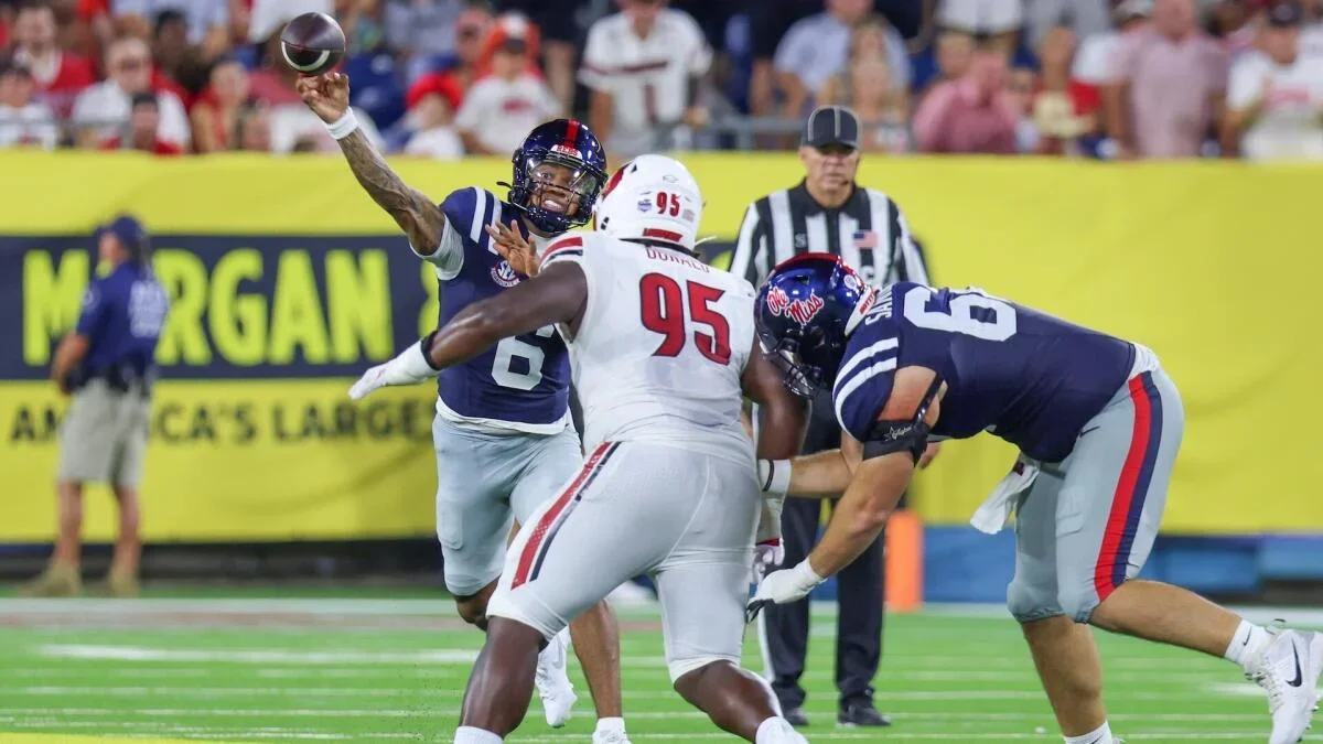 Alexander's 62-yard bursts power Ole Miss past Louisville in Nashville thriller