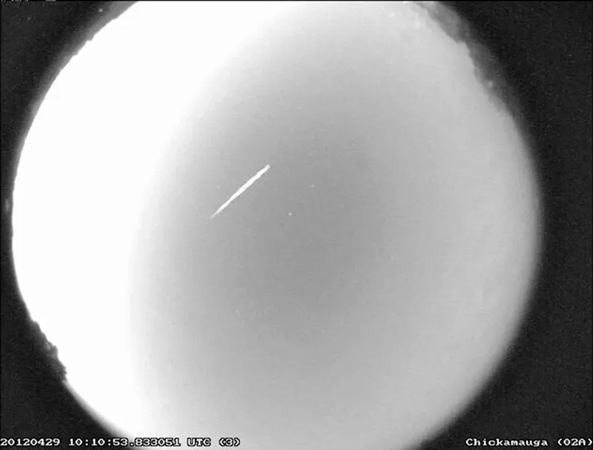 Moonlit Eta Aquarids: Halley’s Debris Dimmed by Bright Moon