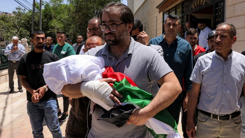 Hebron infant killed after car halts at soldier's signal