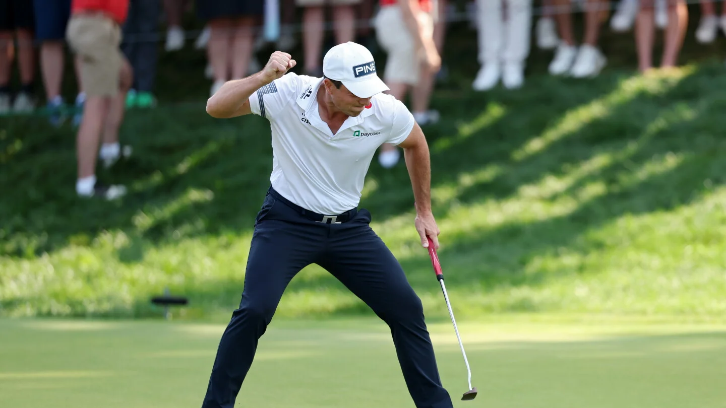 Hovland Surges Past Scheffler in Monday Travelers Playoff to Claim Championship