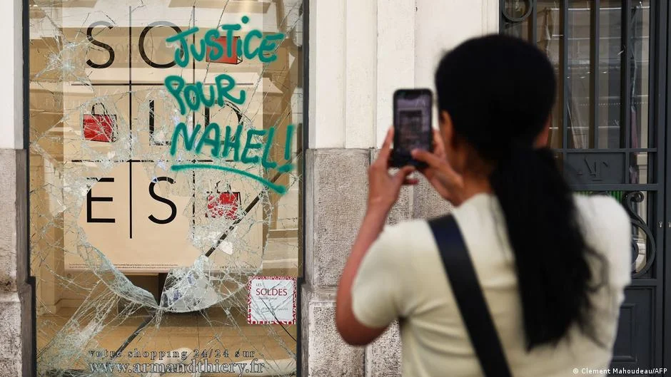 Macron's Germany trip postponed as France grapples with riots