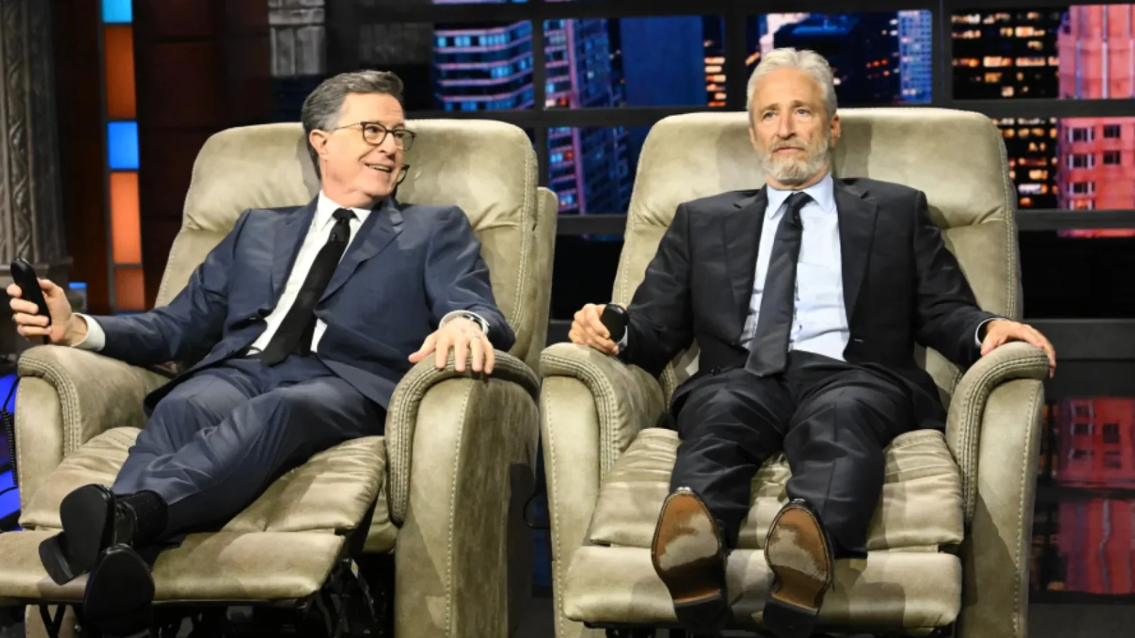Jon Stewart Bids Colbert Farewell With Recliners and Andra Day Performance