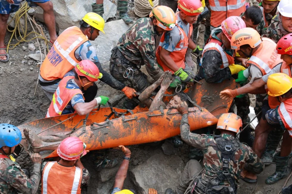 Two rescued from Nepal flood-hit tunnel as hunt for rest continues