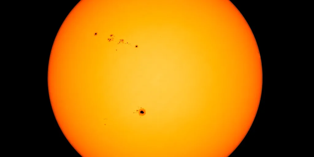 Massive Sunspot Visible to the Naked Eye: Could it Trigger a Solar Storm?