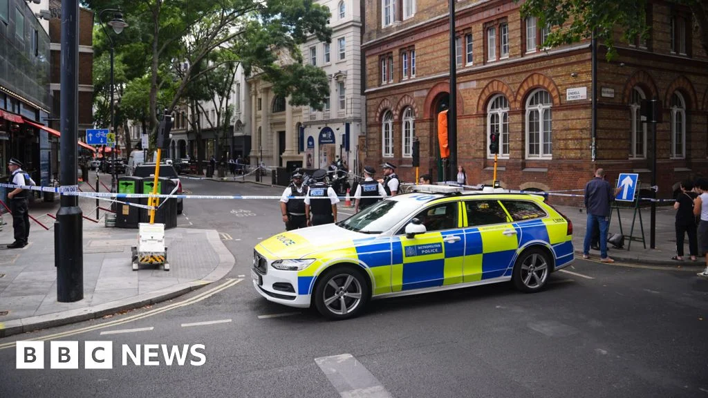 Woman in custody after four attacked as Spurs memorial honors teen Godwin Lawson