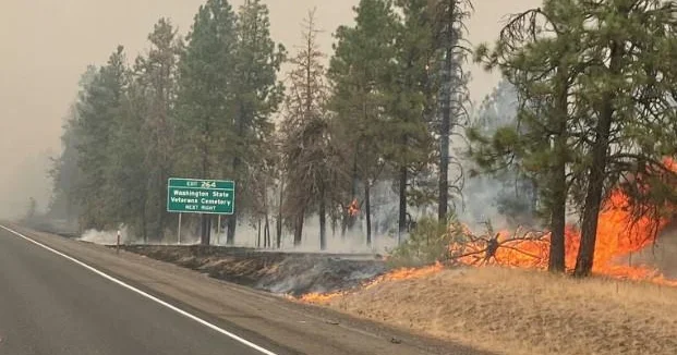 "Deadly Washington State Wildfire Destroys 185 Structures, Sparks State of Emergency"