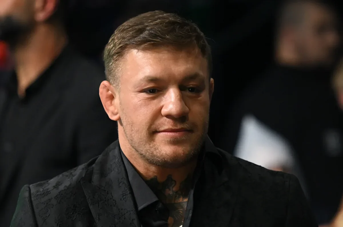 Conor McGregor caught on video leading alleged rape victim into bathroom at NBA game.