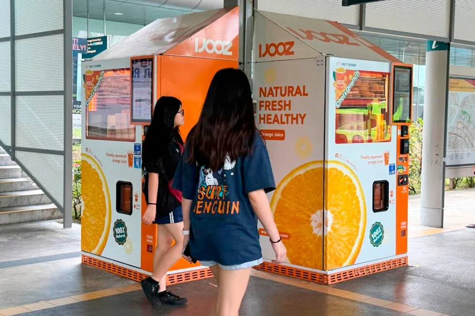 Singapore charges French teen after licking vending-machine straw video