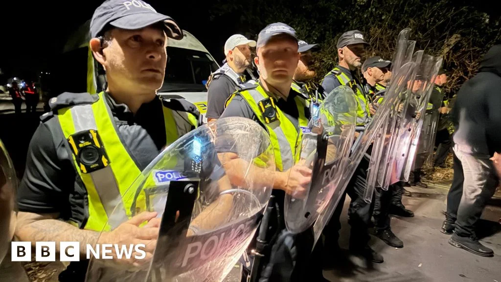 Portsmouth anti-migrant protest: police hunt suspects after clashes injure officers