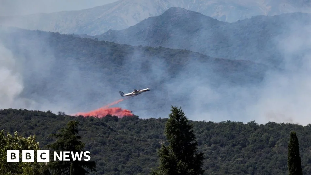Pyrenees blaze forces mass evacuations as France battles scorching heat