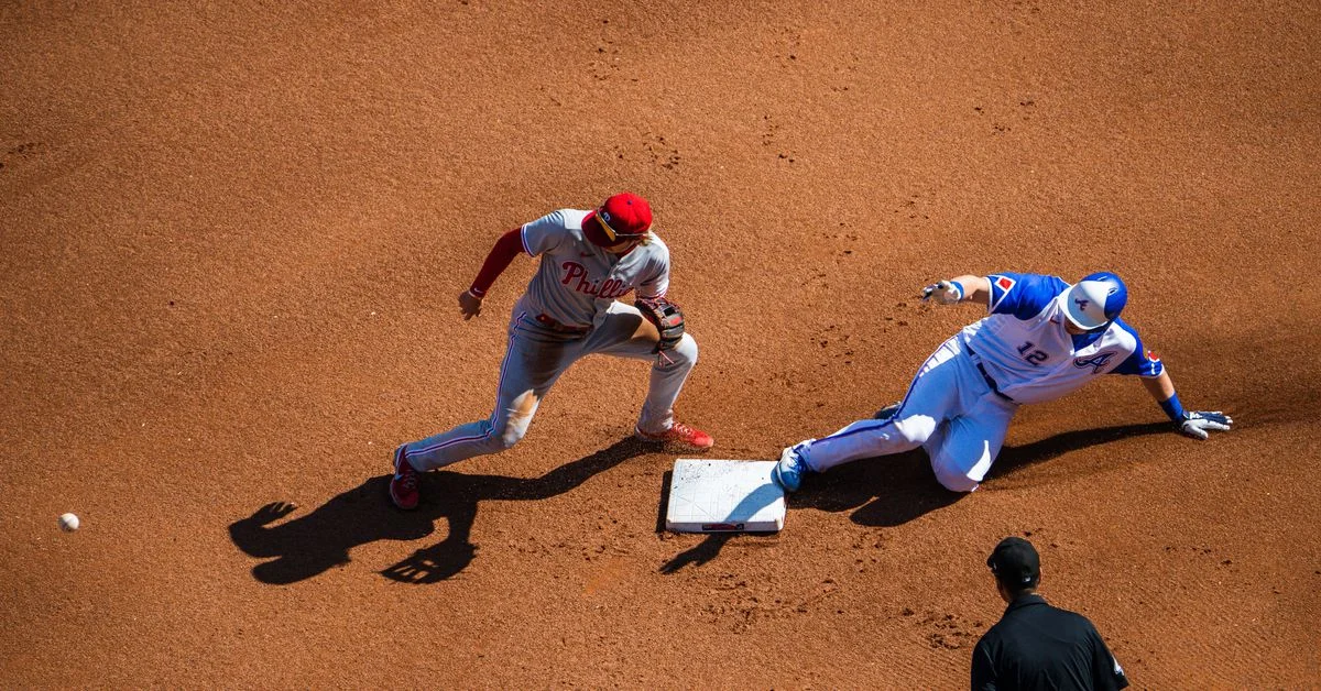 Braves dominate Phillies with 11-4 win in finale.