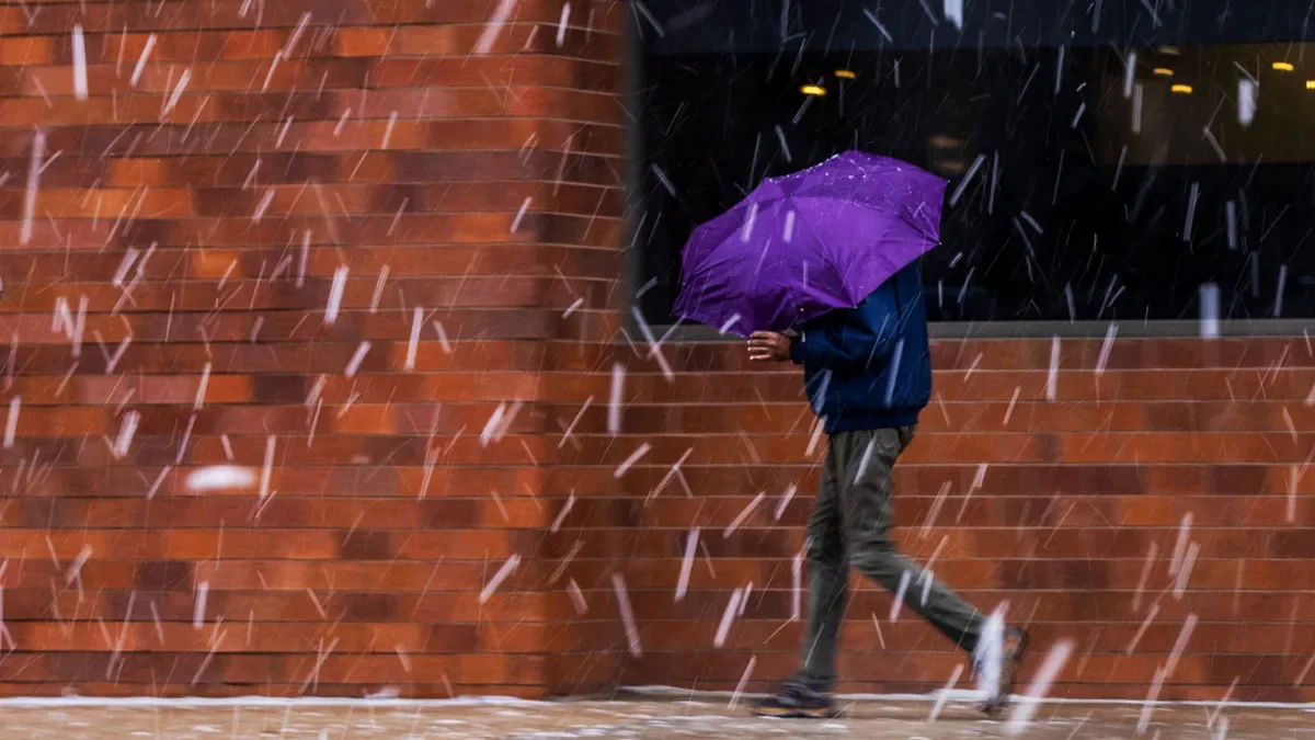 Yosemite National Park partially reopens after closures and snowfall.