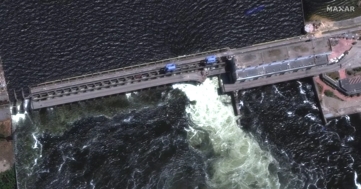 "Kakhovka Dam Destroyed in Ukraine-Russia Conflict, Sparks Evacuations"