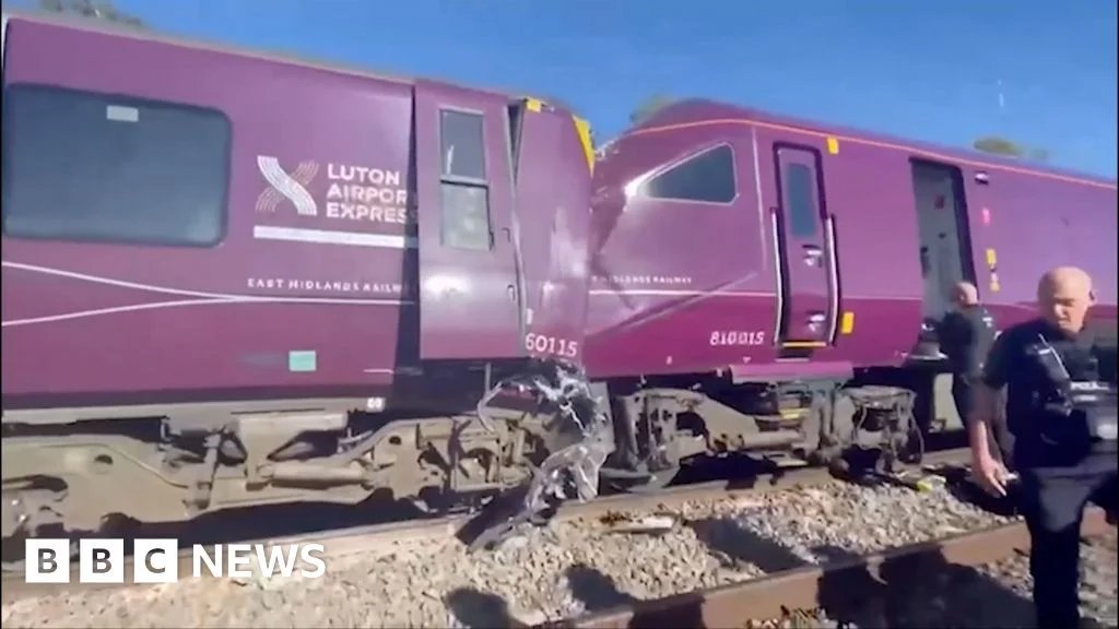 Bedford rail crash leaves driver dead and dozens injured as services halt