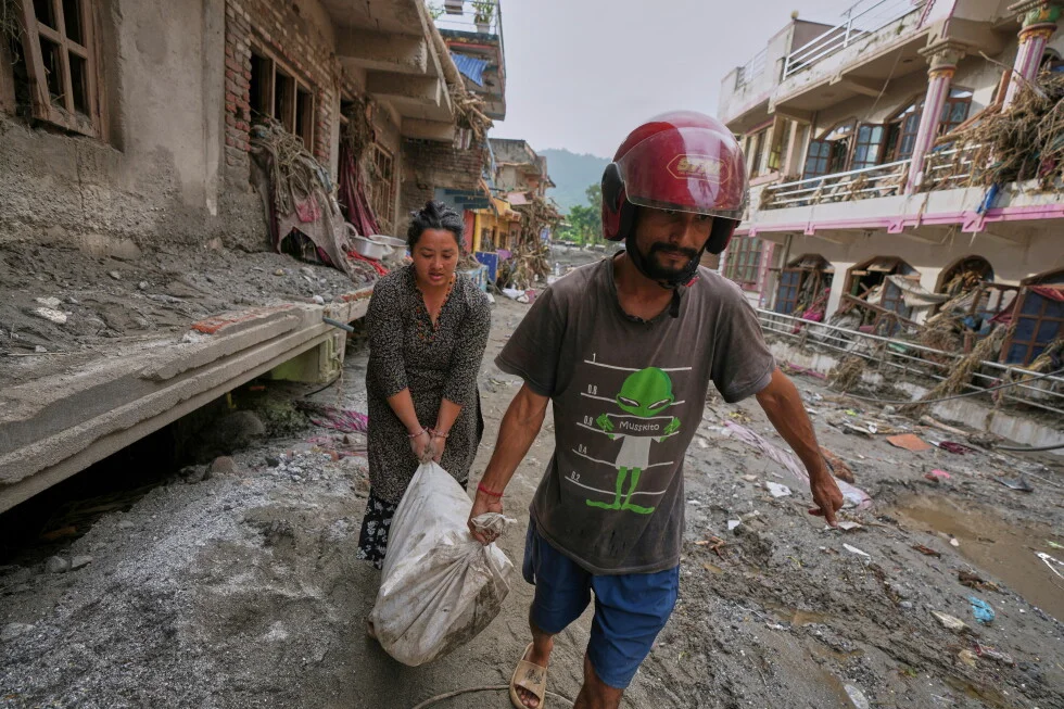 Border floods drive massive Nepal-China rescue push as toll climbs