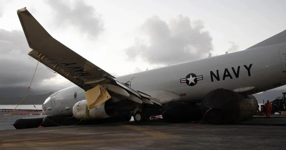 "Navy retrieves crashed spy plane from Hawaii reef, mitigating environmental impact"